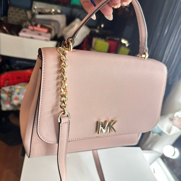 Michael Kors Handbags - Michael Kors Blush Crossbody Bag w MK turnkey lock on front